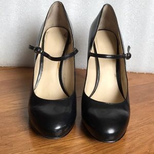 Black leather 3.5” spike heel with arch buckle 7.5